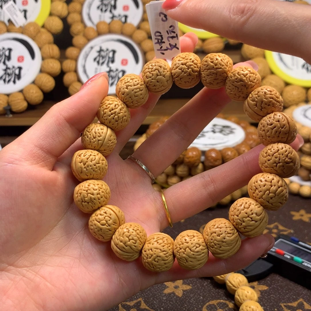 行***提精品桃核苹果园手串