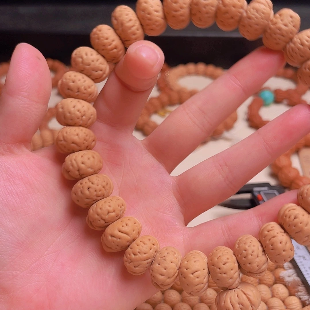 文玩核桃手串清**论桃核