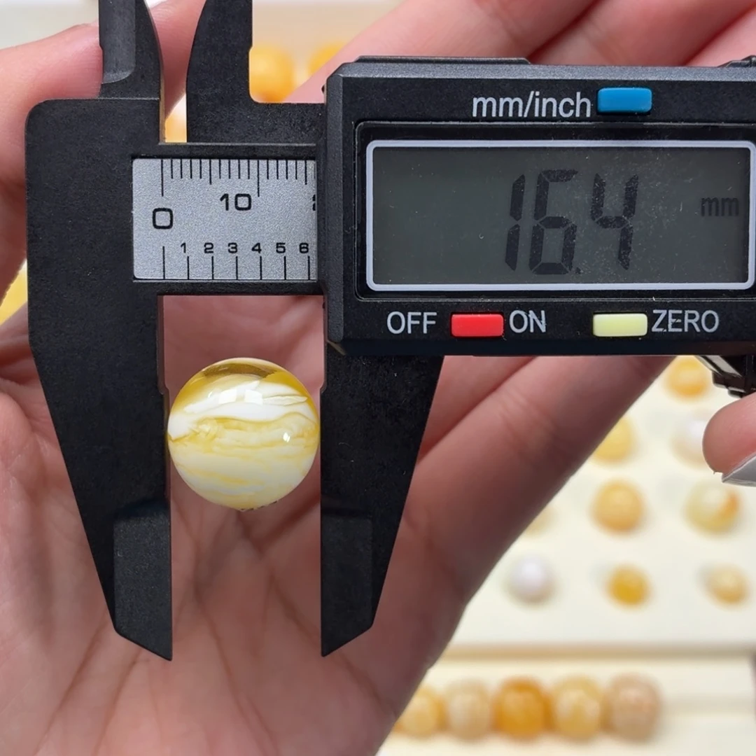 琥珀未镶嵌裸石金白溶洞虎皮纹16mm