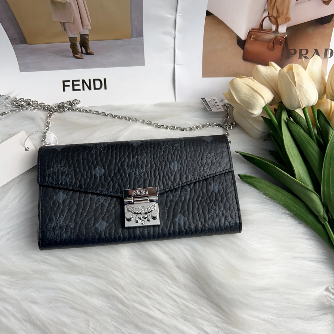 95新 MCM MCM黑色woc单肩包C1505