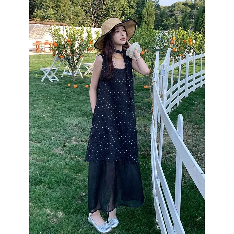黑色赫本风波点无袖连衣裙女2025夏新款法式气质减龄网纱拼接长裙