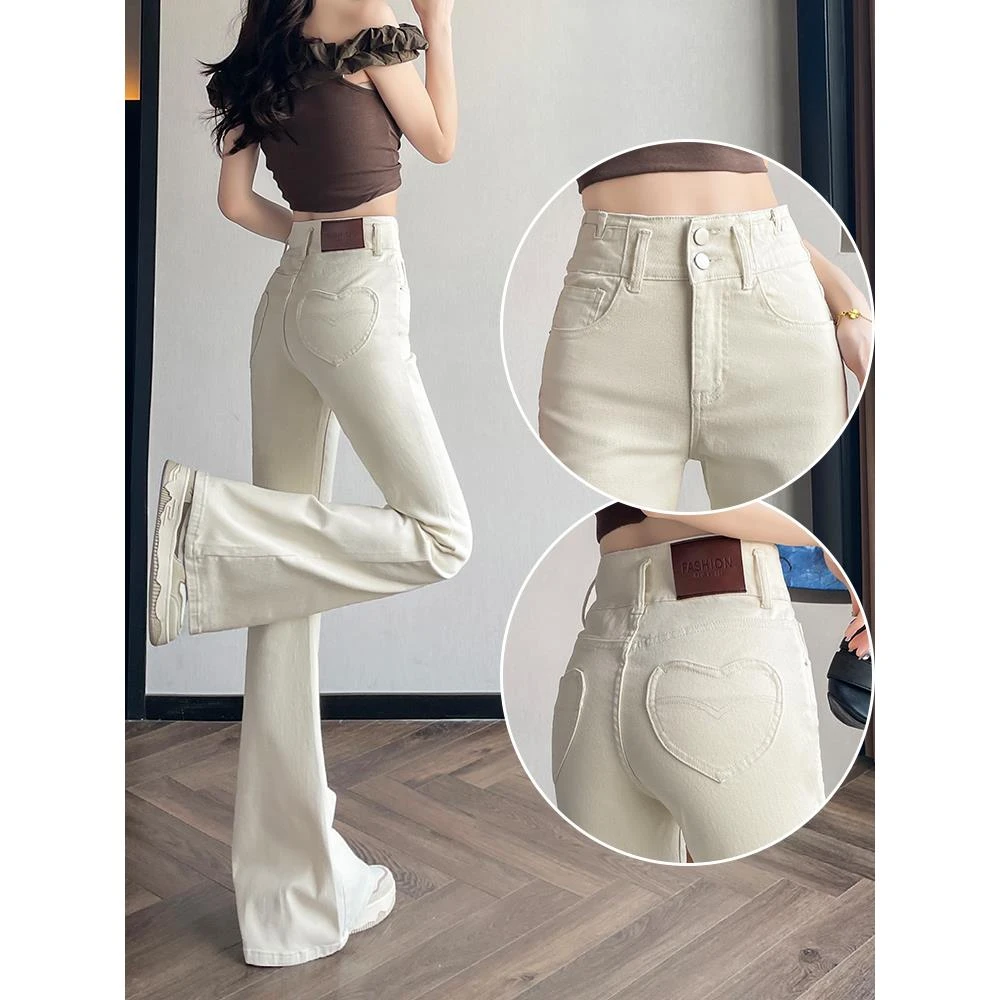 白色美式蜜桃微喇牛仔裤女士冬季加绒加厚设计感弹力提臀马蹄裤子