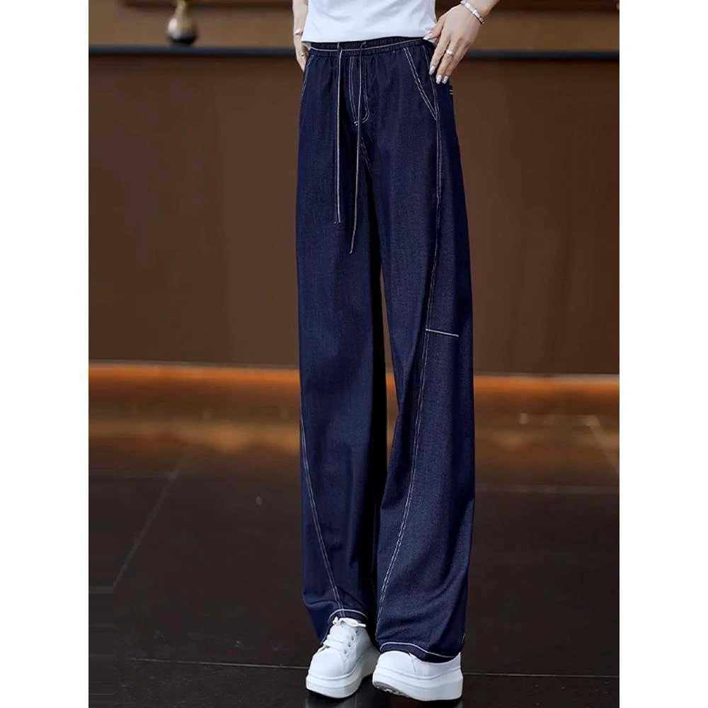 今年流行的深蓝色牛仔裤女2025年夏季新款高腰镰刀裤阔腿香蕉裤子