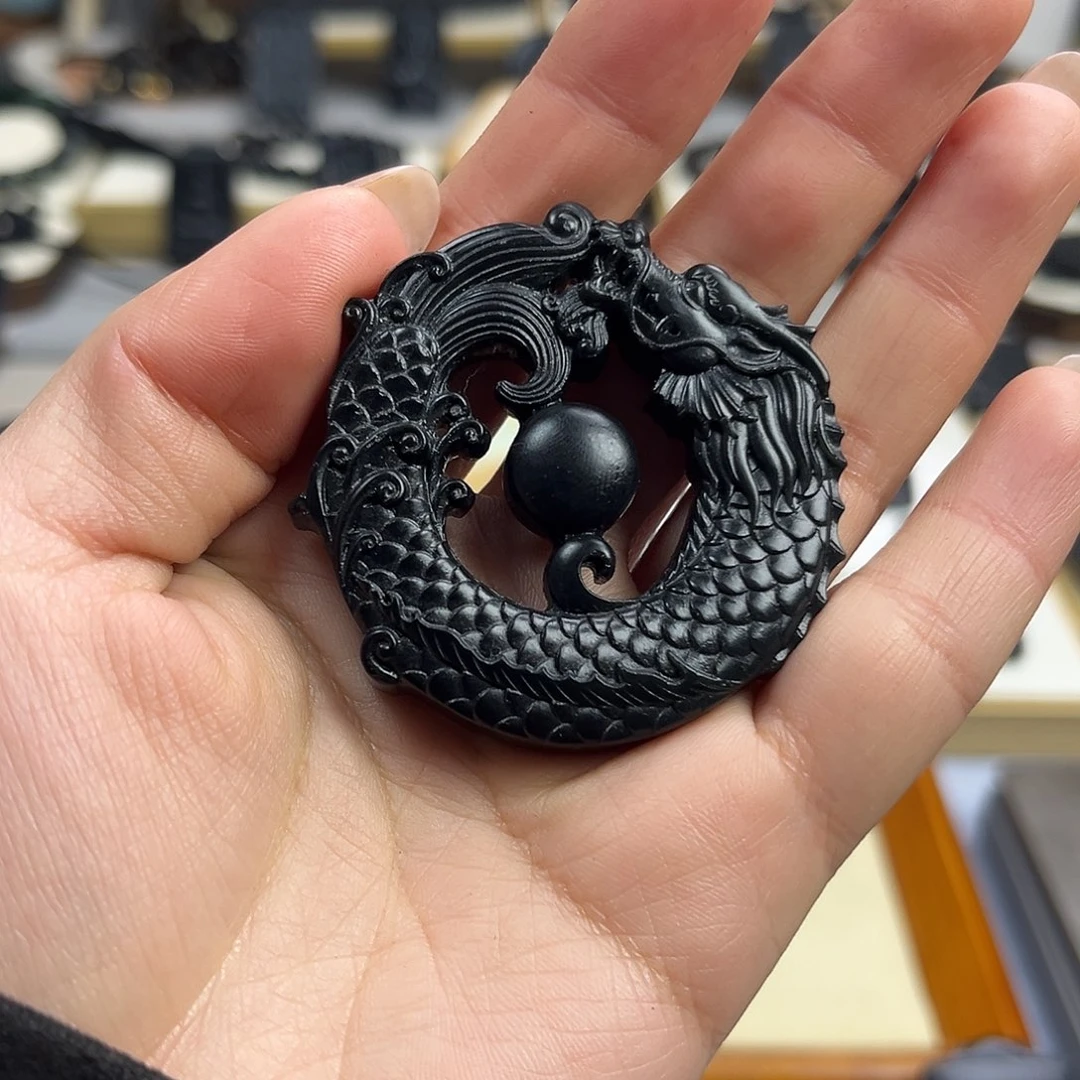 熟***人和田玉（墨玉）未镶嵌颈饰鱼化龙