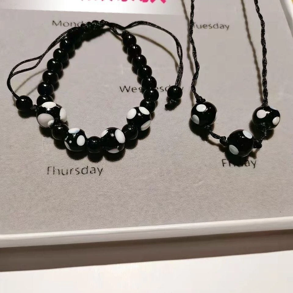 铜石英石吊坠 民族风男女通用女黑色卡通风编绳串珠欧若智性风