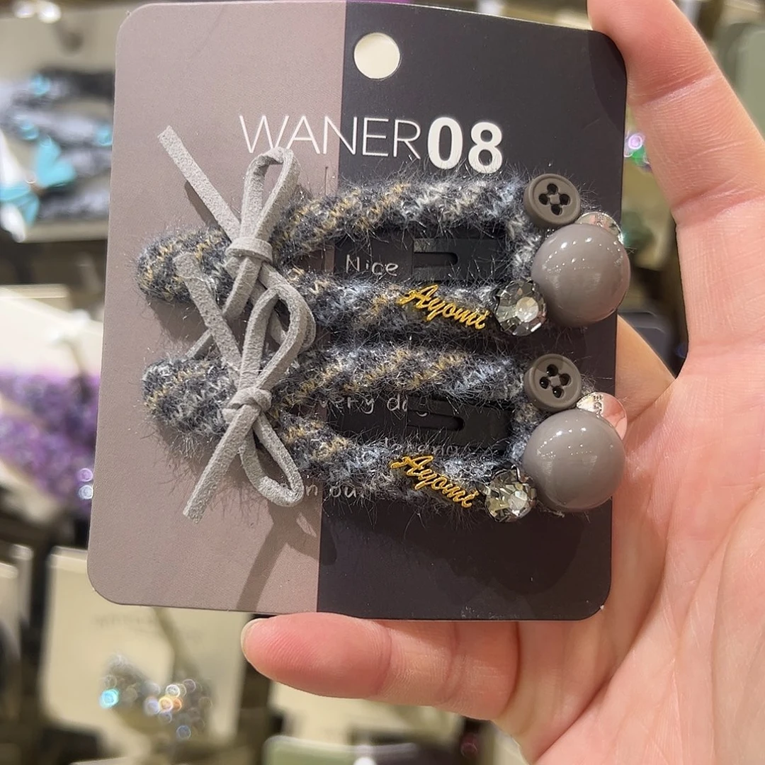 布艺非金属灰蓝色蝴蝶结拜拜夹