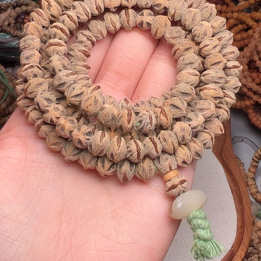 被***嘴吊坠柏香籽/百香籽