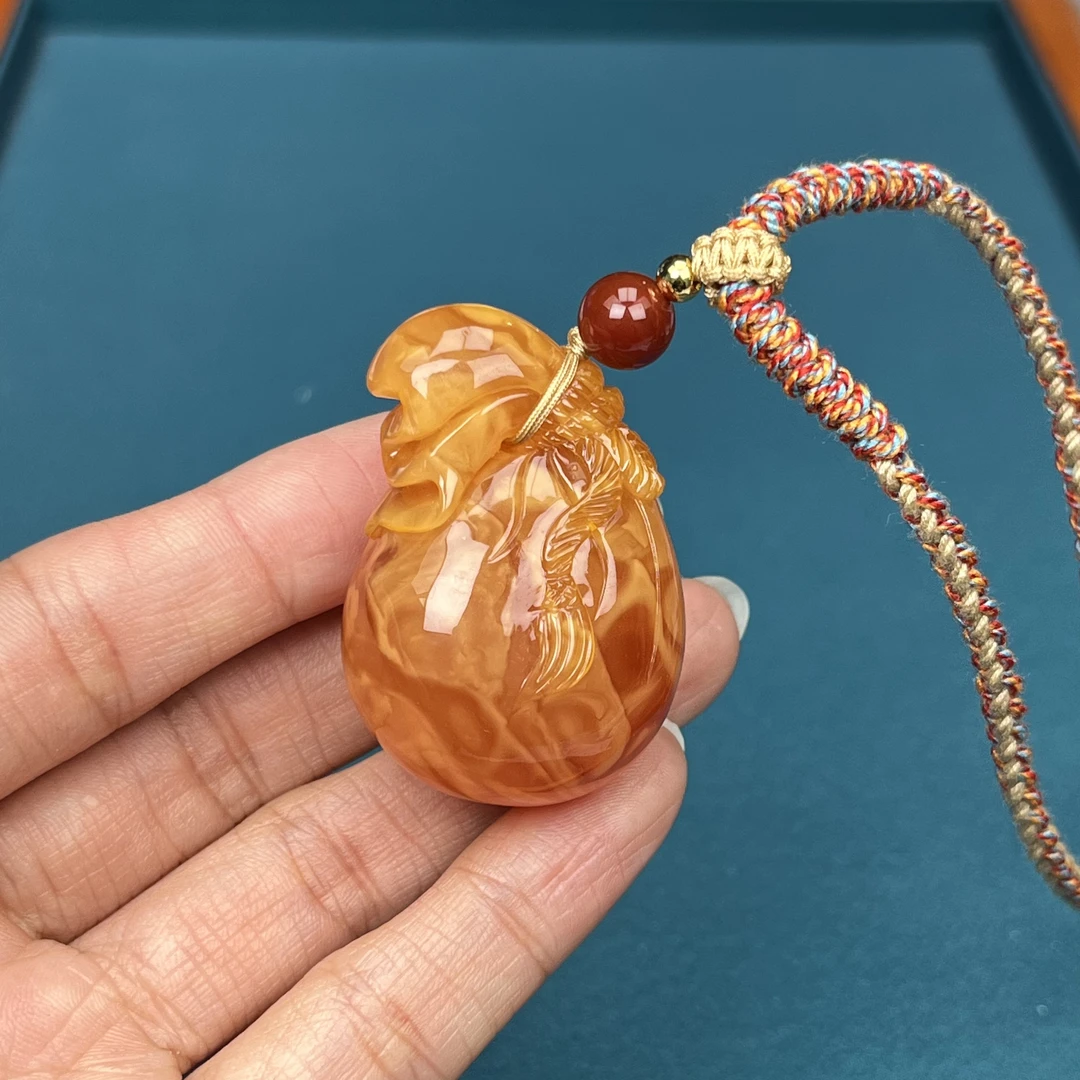 Y3040天然原矿蜜蜡 鸡油红钱袋子 29*42mm抖音基地质检发货