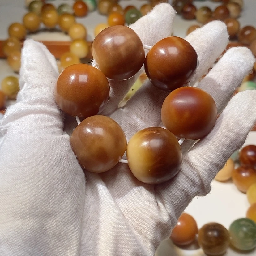 【闪购商品】菩提根/象牙果吊坠金***麻瑕398