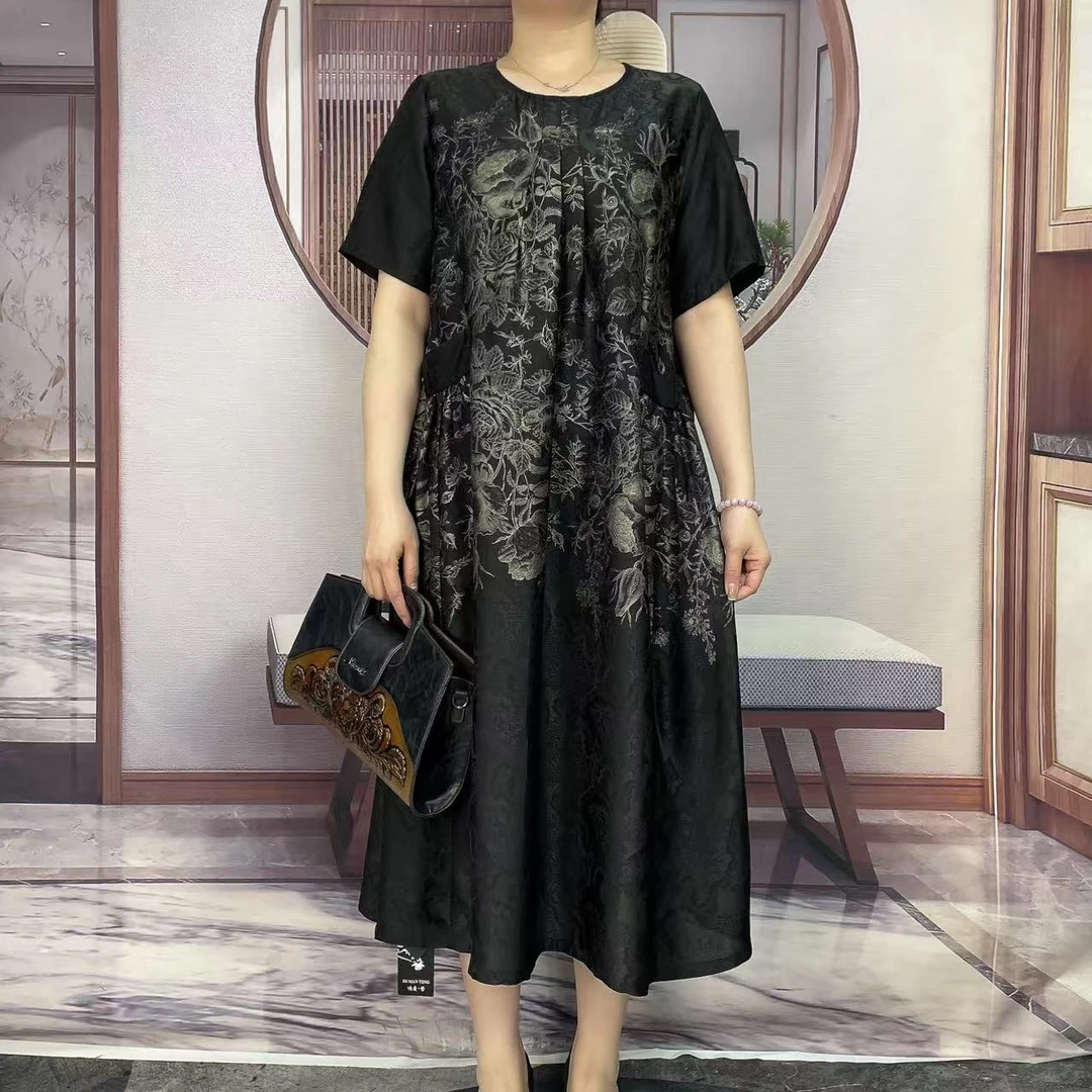 Q27004新款圆领树叶花连衣裙