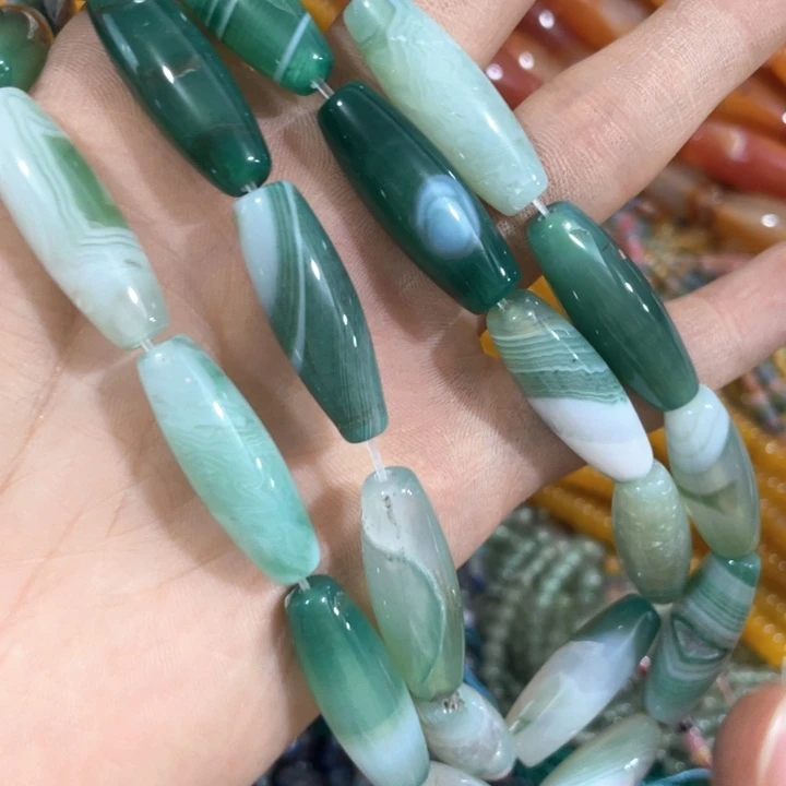 贝壳非金属一条绿色天珠有洞