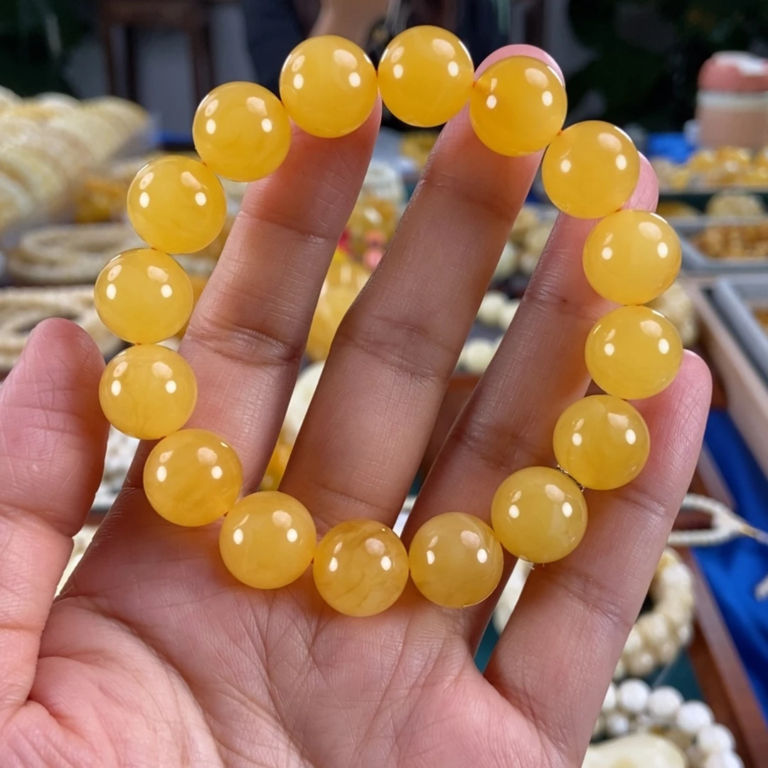 琥珀未镶嵌珠宝奇石13+鸡油红圆珠20.84