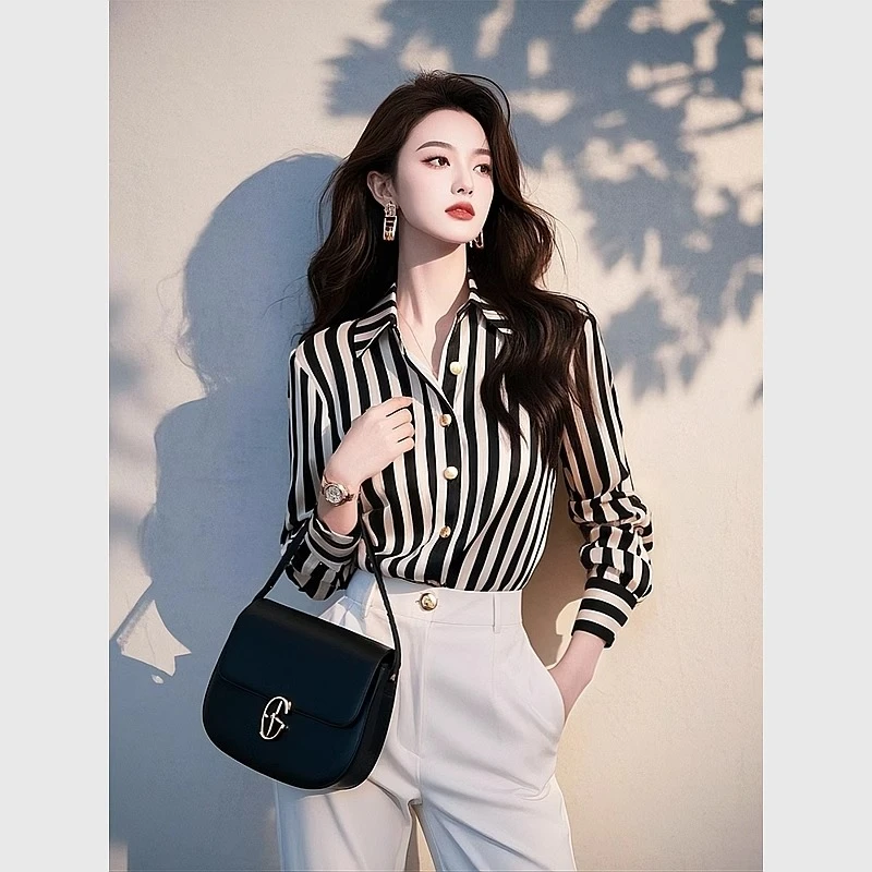 今年爆款黑白撞色条纹衬衫女2025早春轻奢高级感职业通勤法式衬衣