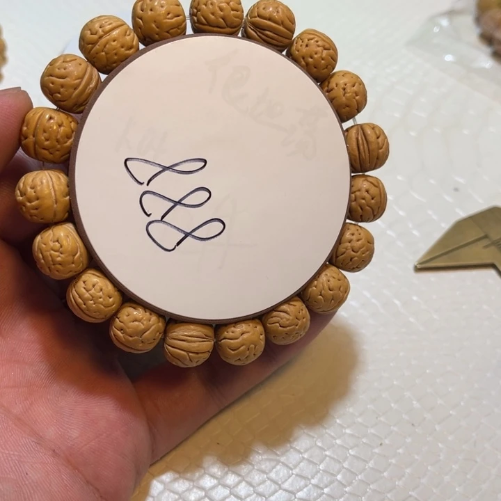 巴***鲁桃核手串666号三道筋