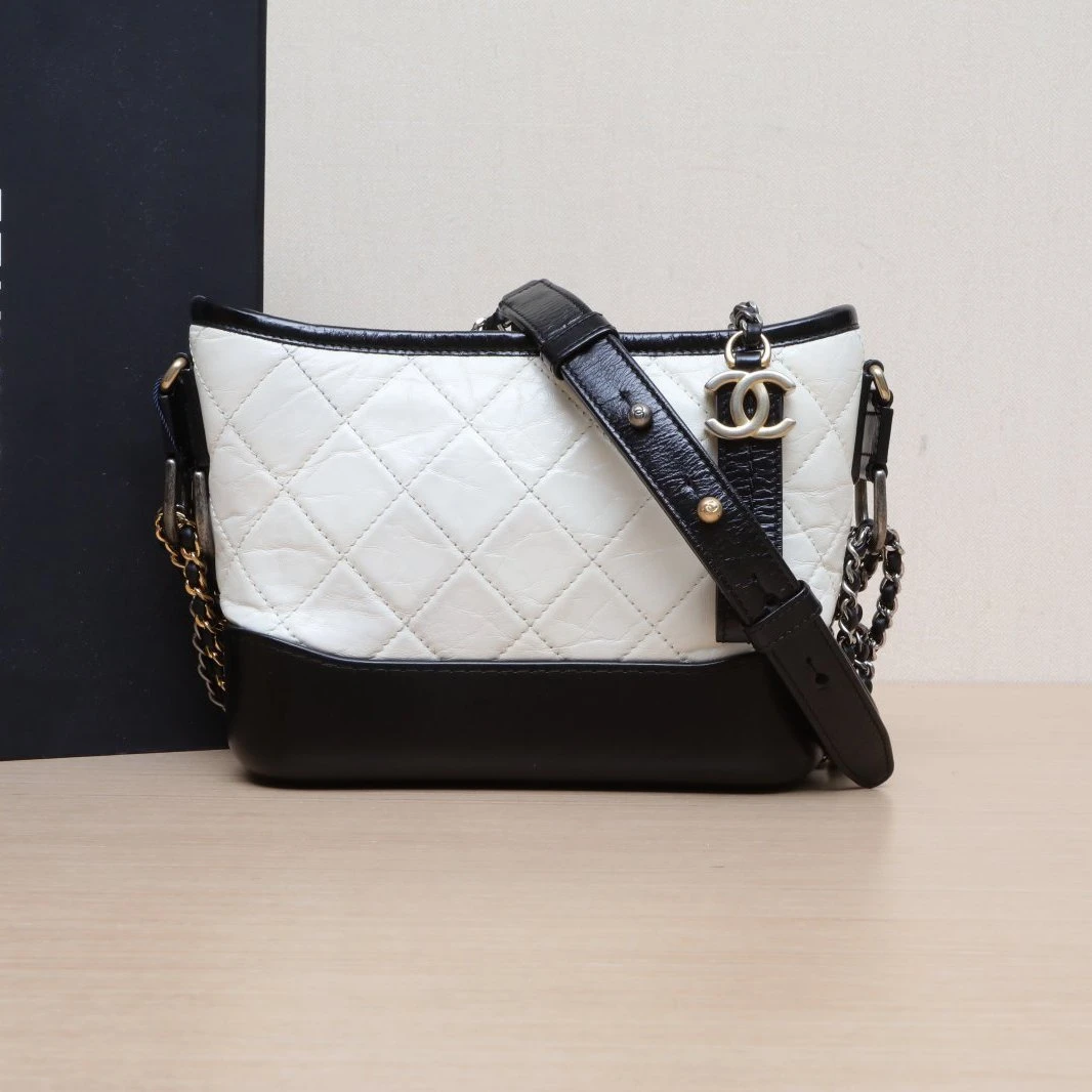 95新 Chanel/香奈儿 小花柳 流浪 小号 白色 28开 金银扣 黑底