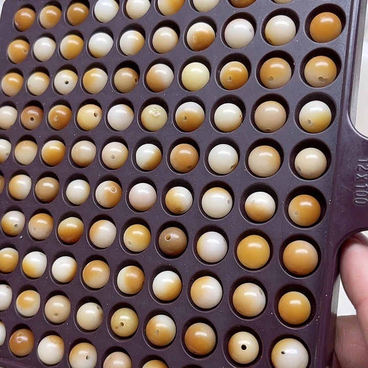 白玉菩提吊坠瑕疵10炭烤108颗