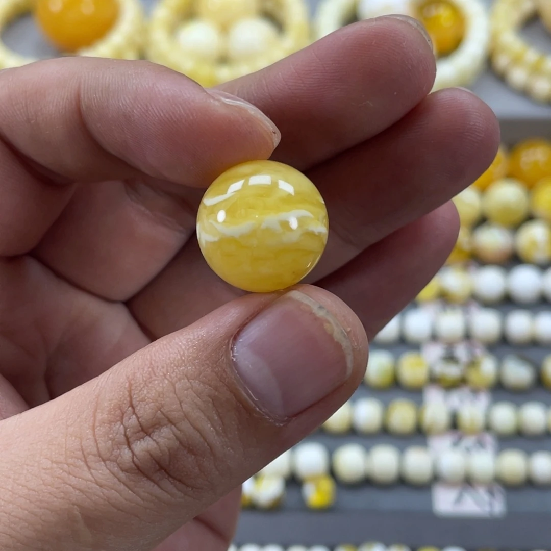 程***c蜜蜡未镶嵌裸石俄料虎皮圆珠