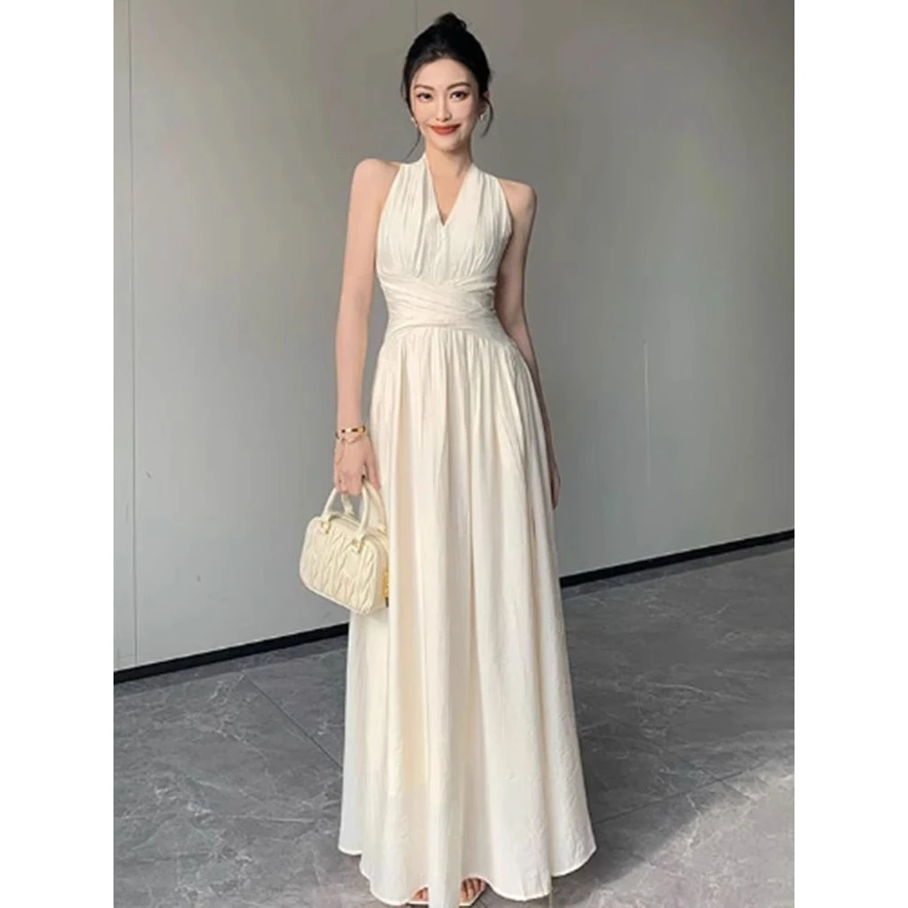 法式白色无袖挂脖v领连衣裙女2025夏季新款绝美收腰显瘦大摆长裙