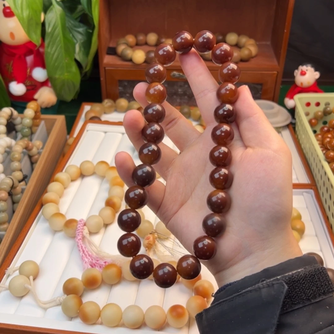 菩提根/象牙果手串曹**、手持丢丢