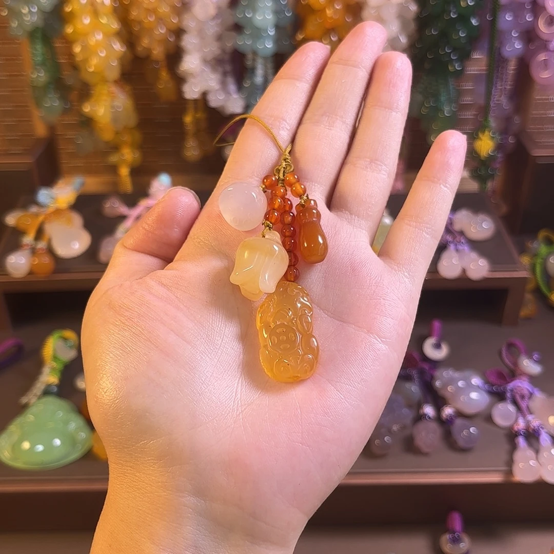 桃***开玛瑙/玉髓未镶嵌车挂福利款手机链