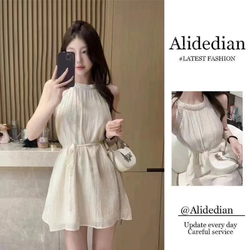 新款气质显瘦A字高级感杏色收腰纯欲短裙法式轻奢挂脖洋气衣服女