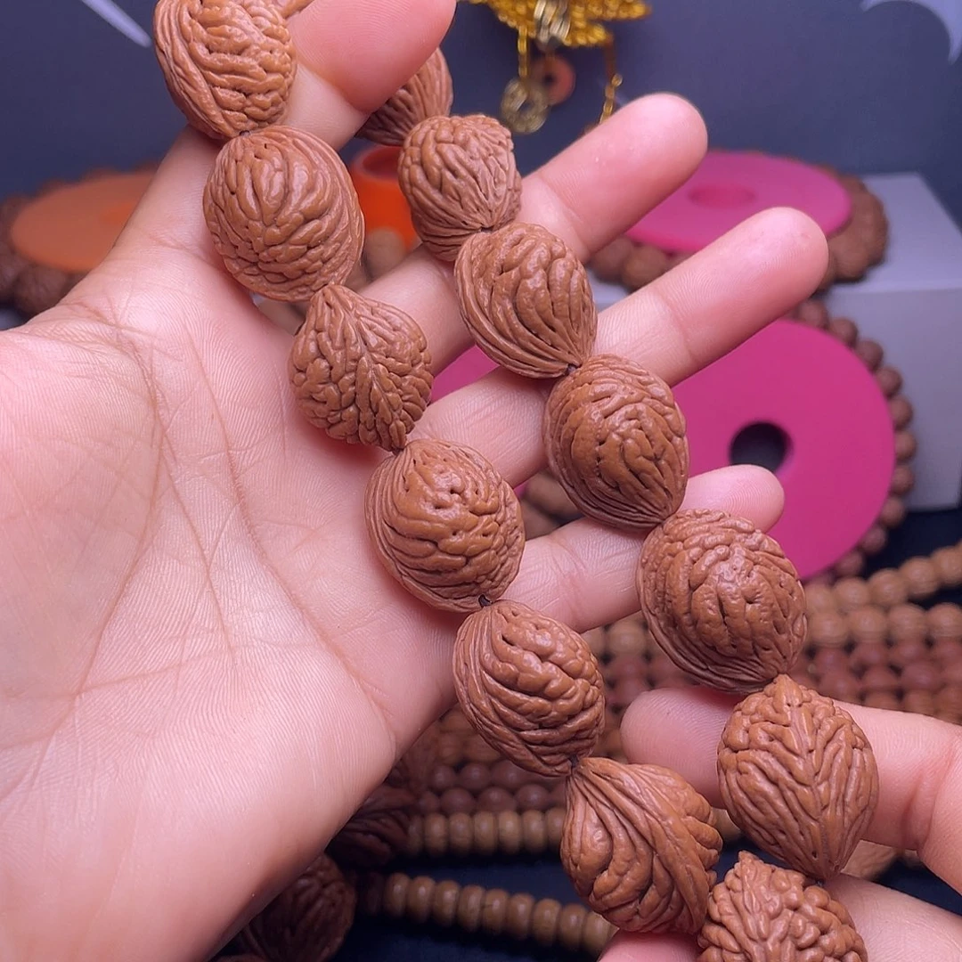 *****吊坠桃核秦岭桃枭手持15颗籽