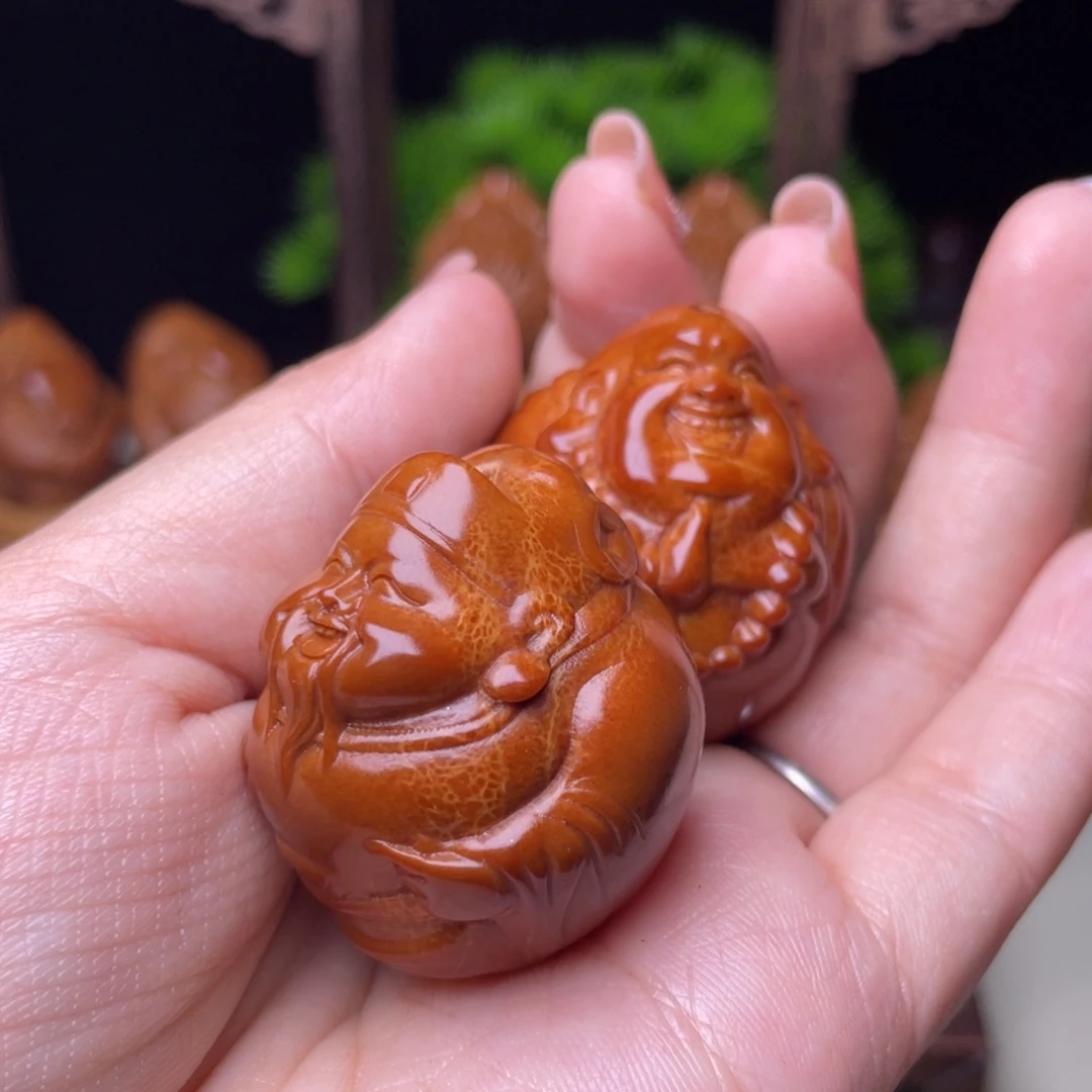 吊坠橄榄核歌****?财迷手球