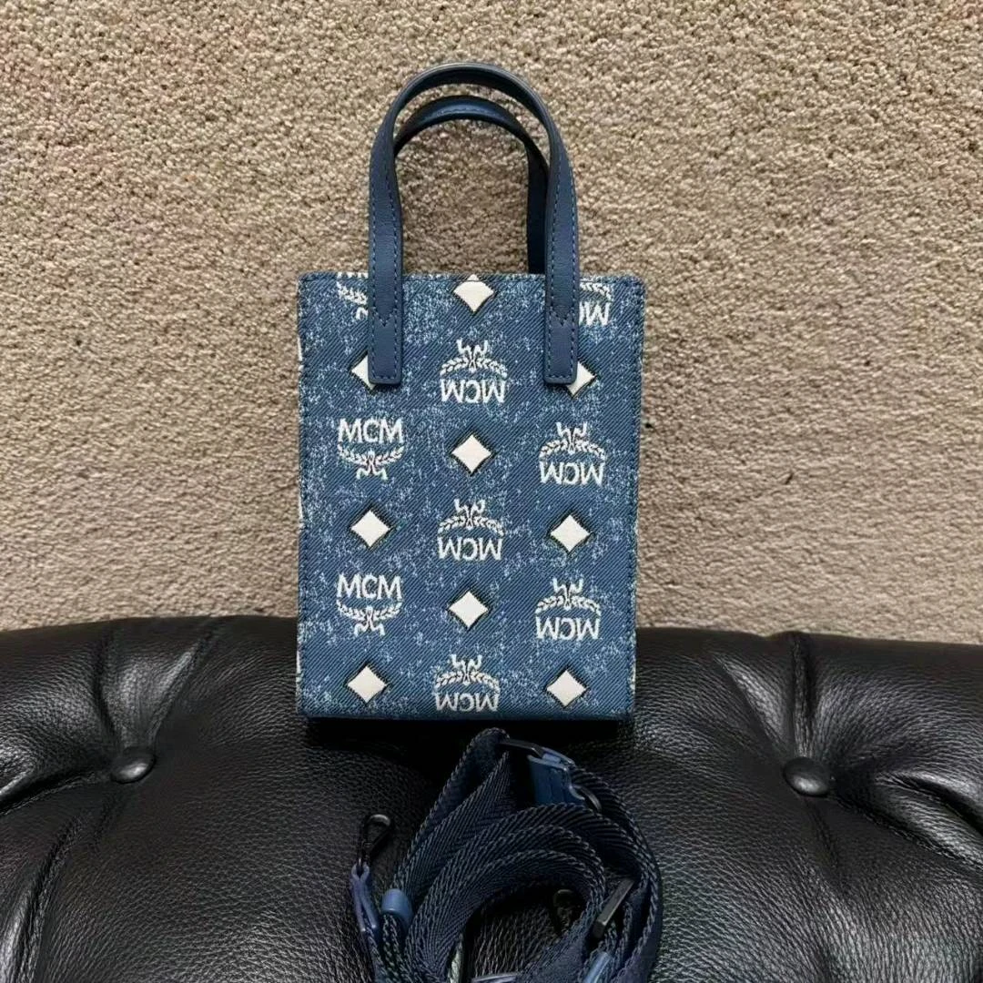 99新 MCM 蓝色丹宁 竖版老花单肩包