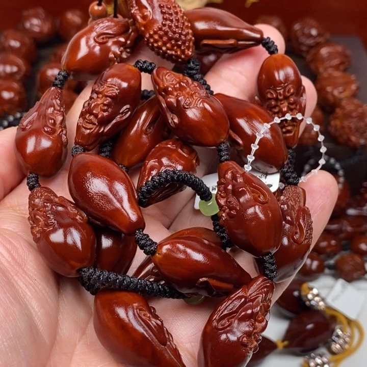 橄榄核吊坠健*887776665