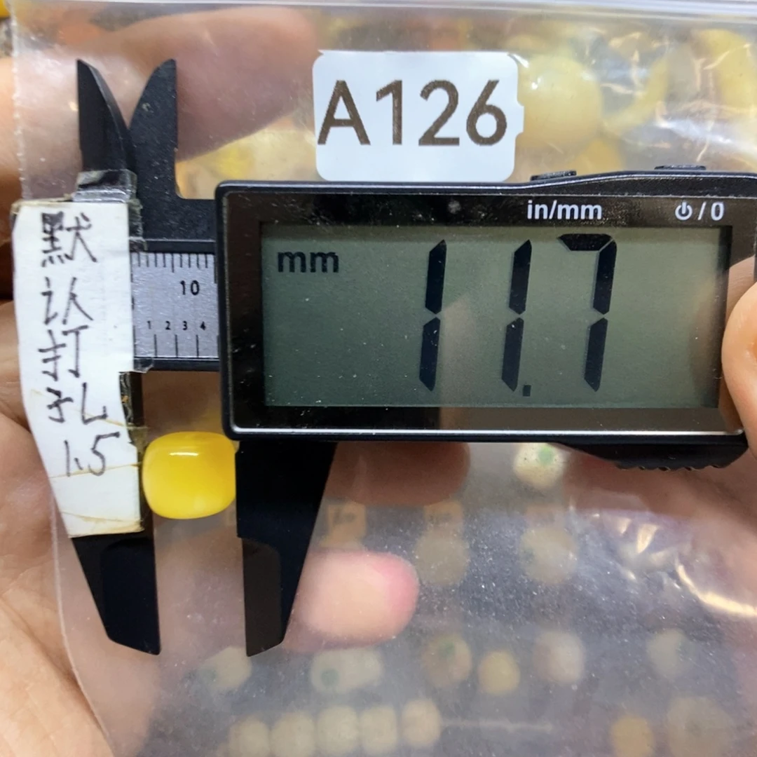 橙***丶裸石蜜蜡未镶嵌好