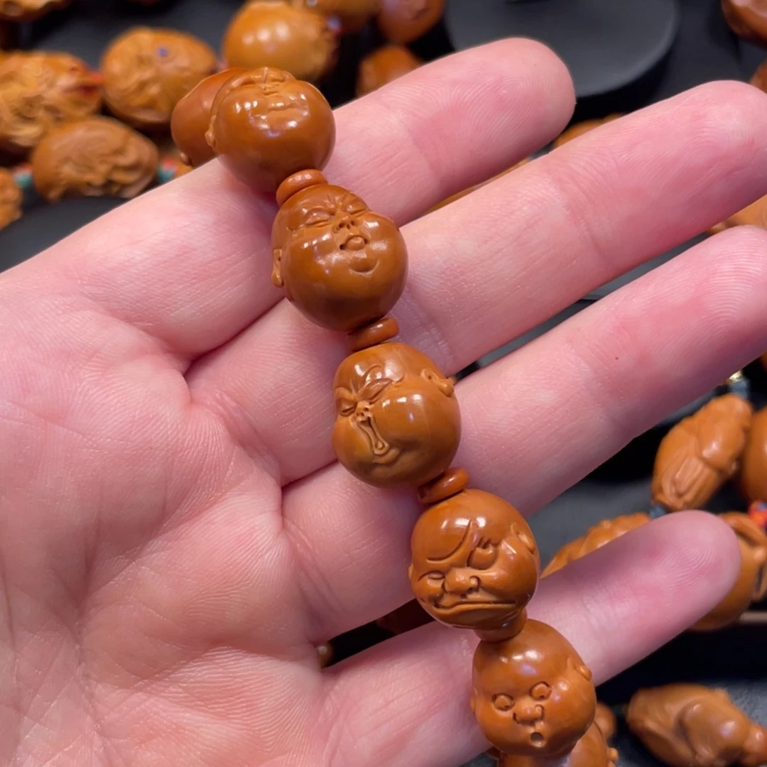 牵***街手串/手链橄榄核百态1.5