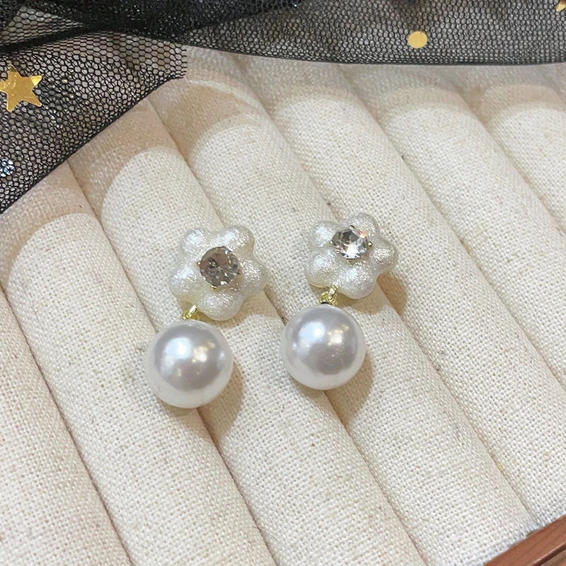 黄铜陶瓷耳饰 珍珠花朵耳环女2023新款爆款气质耳坠小众设计轻奢