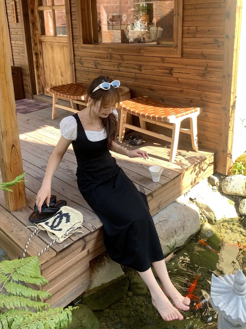 夏季新款拼接裙子女气质设计感黑色长款休闲连衣裙