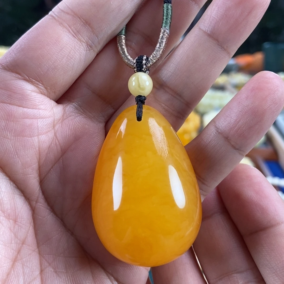 琥珀未镶嵌珠宝奇石鸡油红蜜蜡水滴吊坠19.8