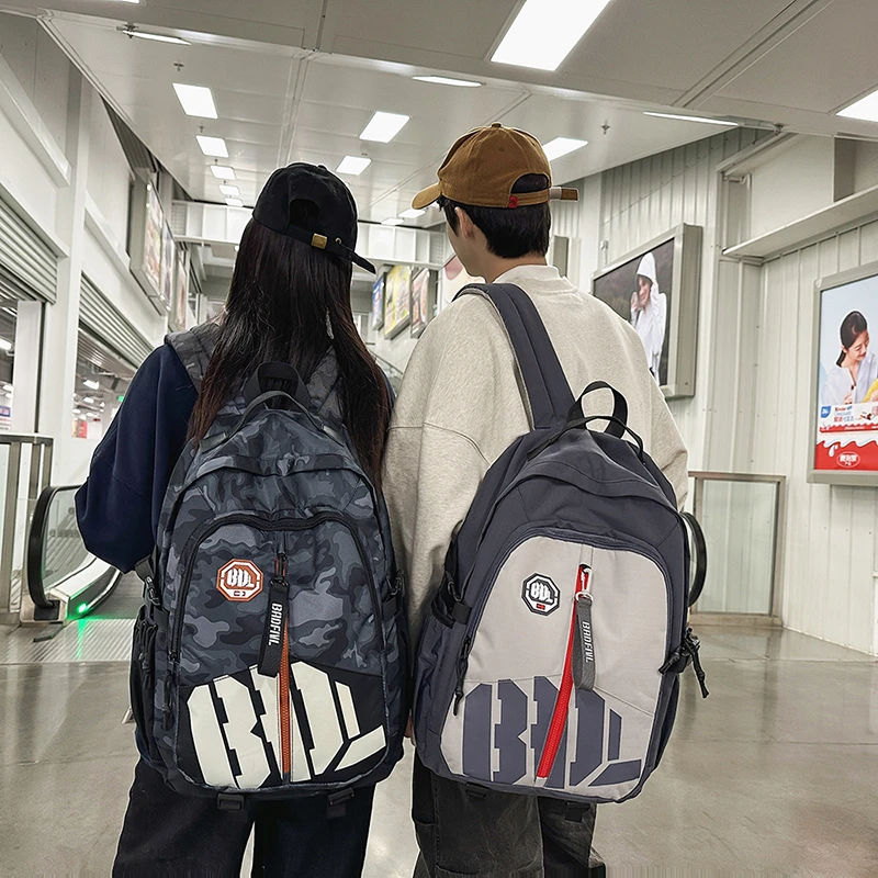 新款书包初中高中生大学生男生女生休闲时尚百搭简约潮流双肩背包