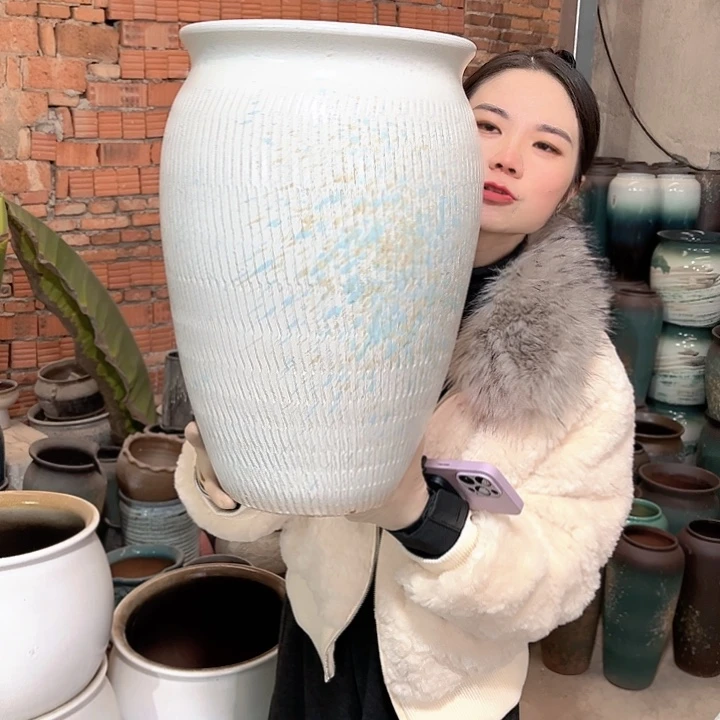 瑕疵口26高40花盆……