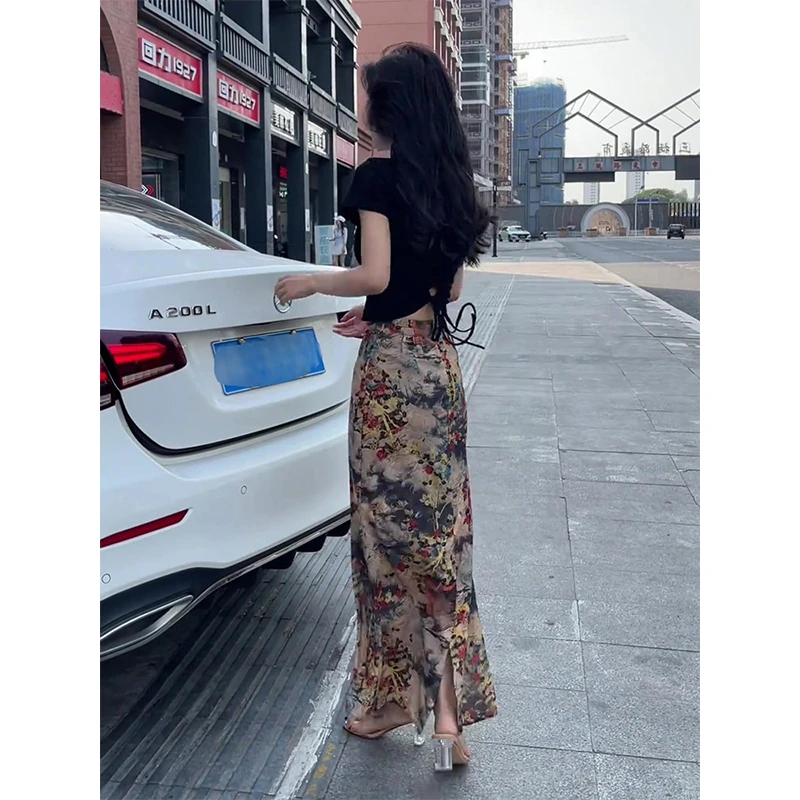 高级感复古碎花高腰a字半身裙2025新款夏季显瘦后开叉包臀长裙子