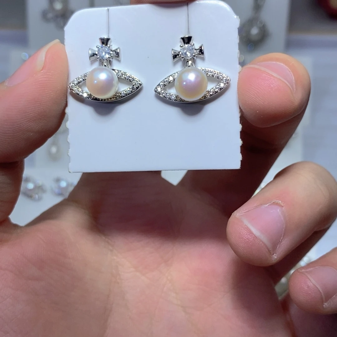 淡水珍珠银S925镶嵌耳饰