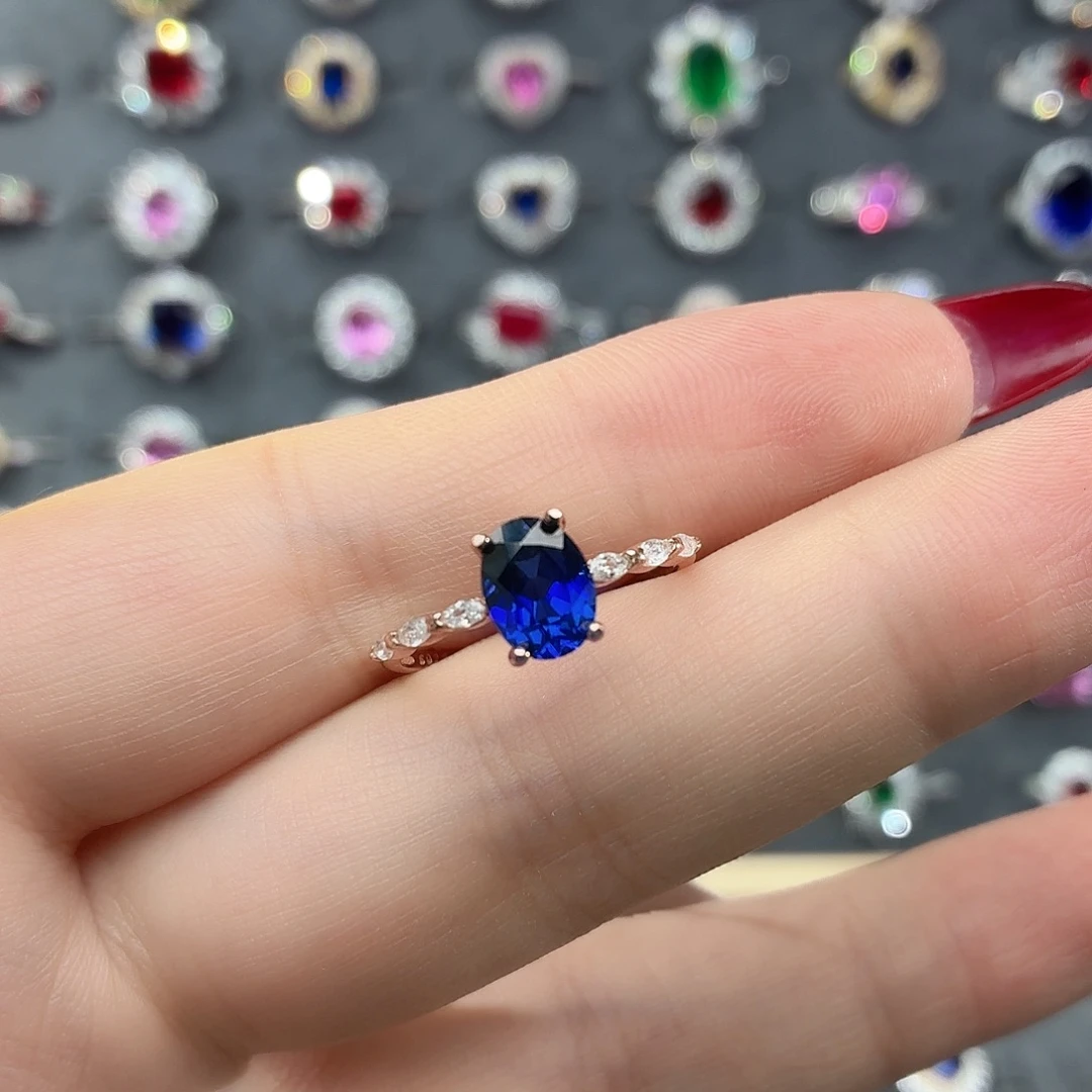 925银培育皇家蓝色宝石白金色固口港码15#