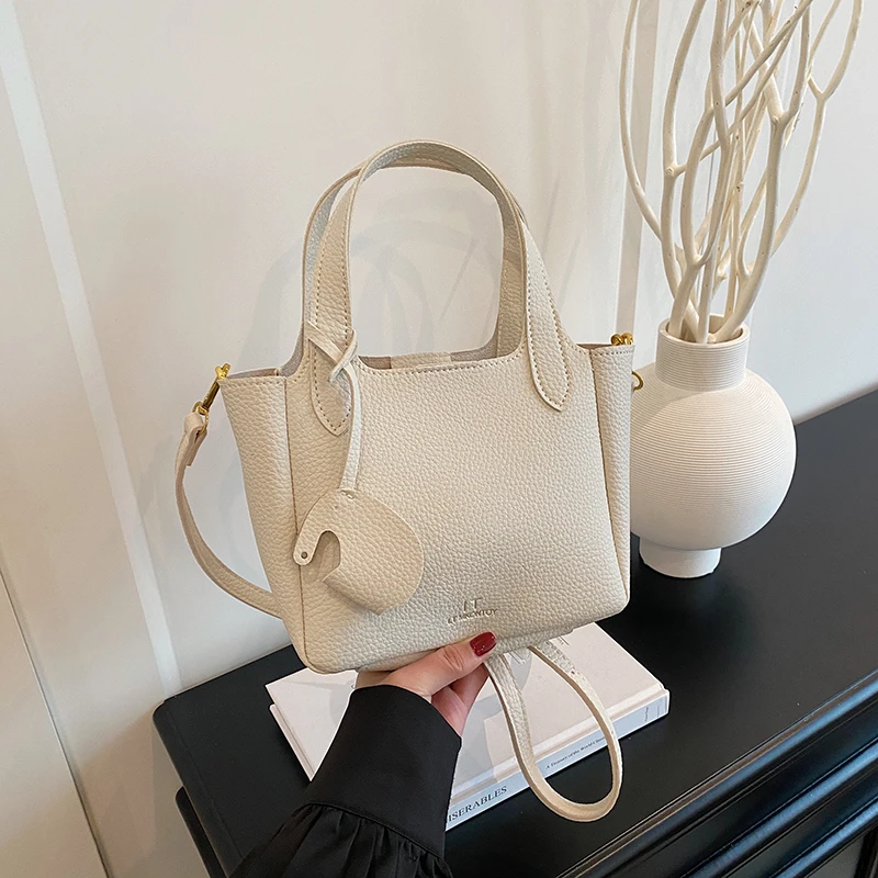 【上宽24下宽20高16厚8】新款时尚轻奢百搭潮流单肩斜挎包1185白色