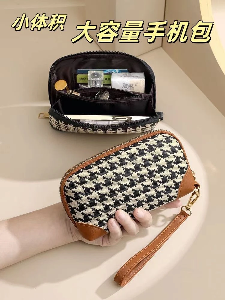 贝壳手机零钱手拿包女士化妆包便携外出一体包新款轻便大容量钱包