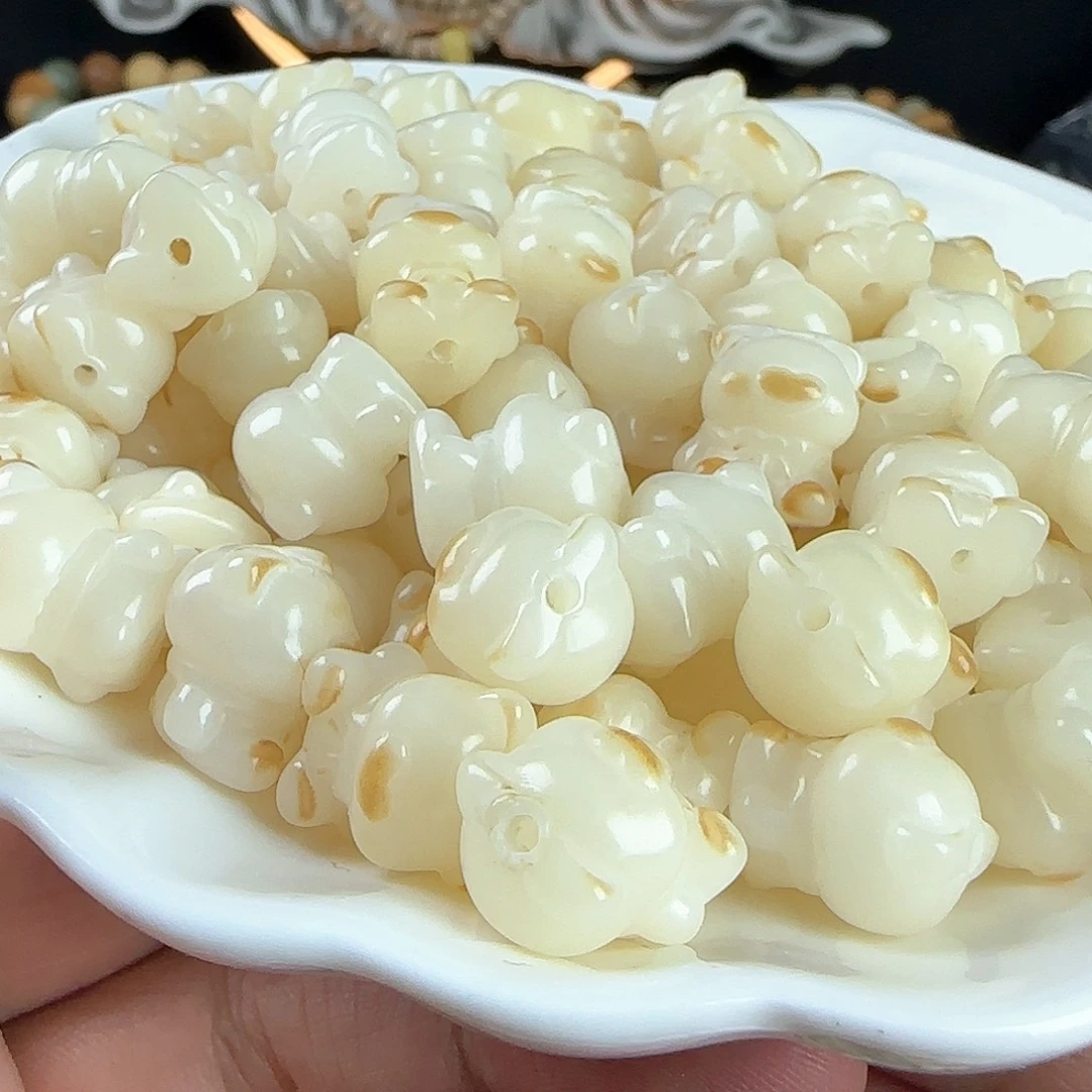 菩提根/象牙果手串瑕疵卡14炭烧爱心熊10颗