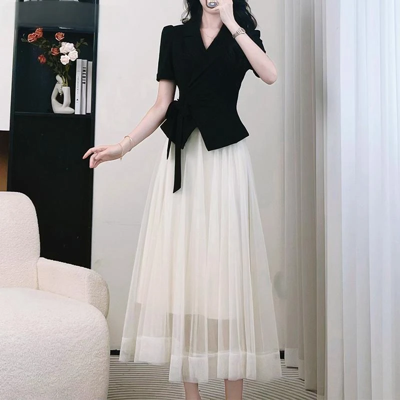 黑色法式洋气连衣裙女夏修身气质高级感今年流行爆款西装长裙