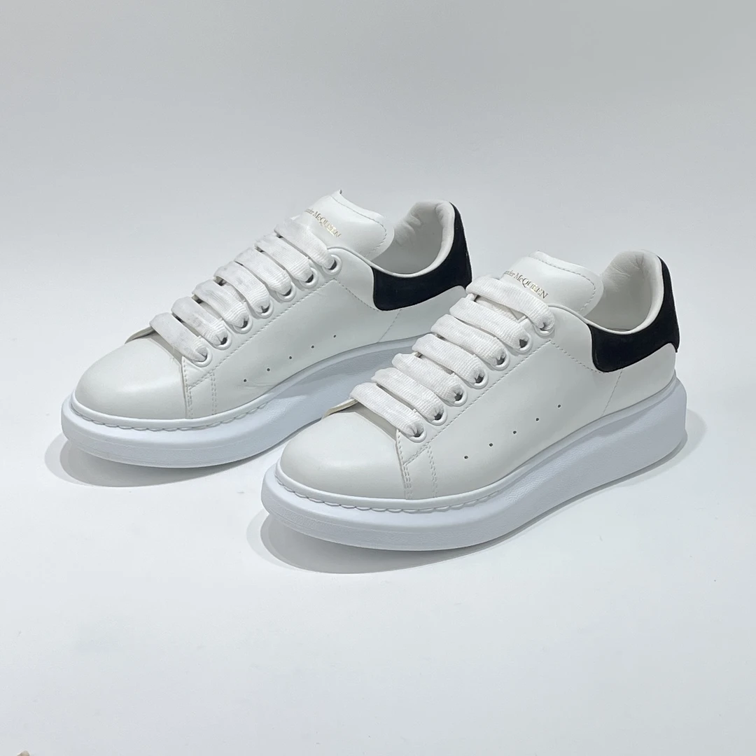 95新 Alexander McQueen/亚历山大·麦昆 38码 黑尾小白鞋/ML80763