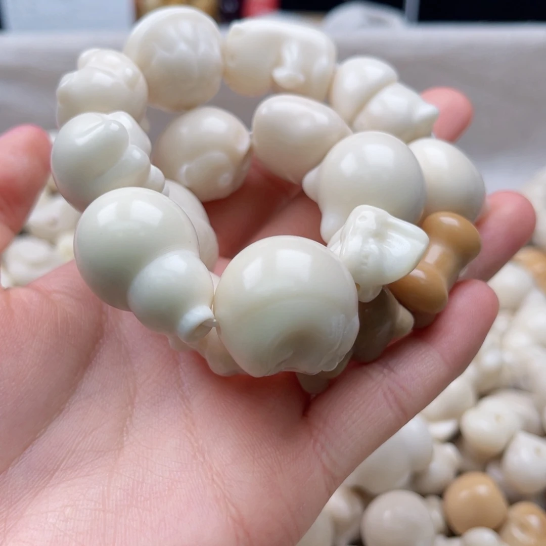 白玉菩提吊坠z15-25mm/5颗白象牙果瑕