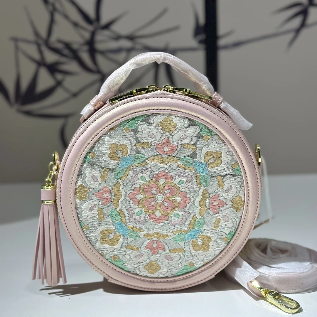 【孤品】非遗手工真丝唐锦 粉色流苏圆饼包宝相花 手拎斜挎包