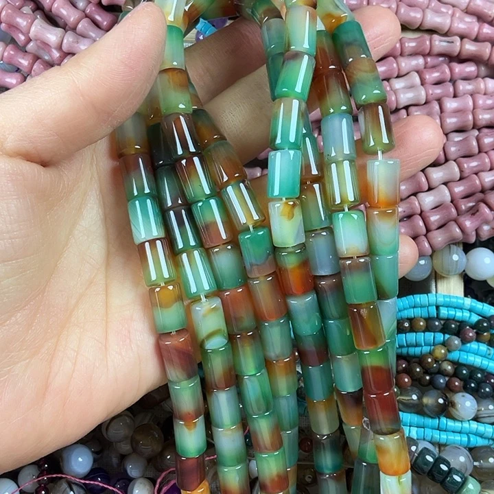 查罗石散珠合金卡8*12孔雀玛管管一条