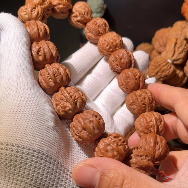 君***强文玩核桃手串………………