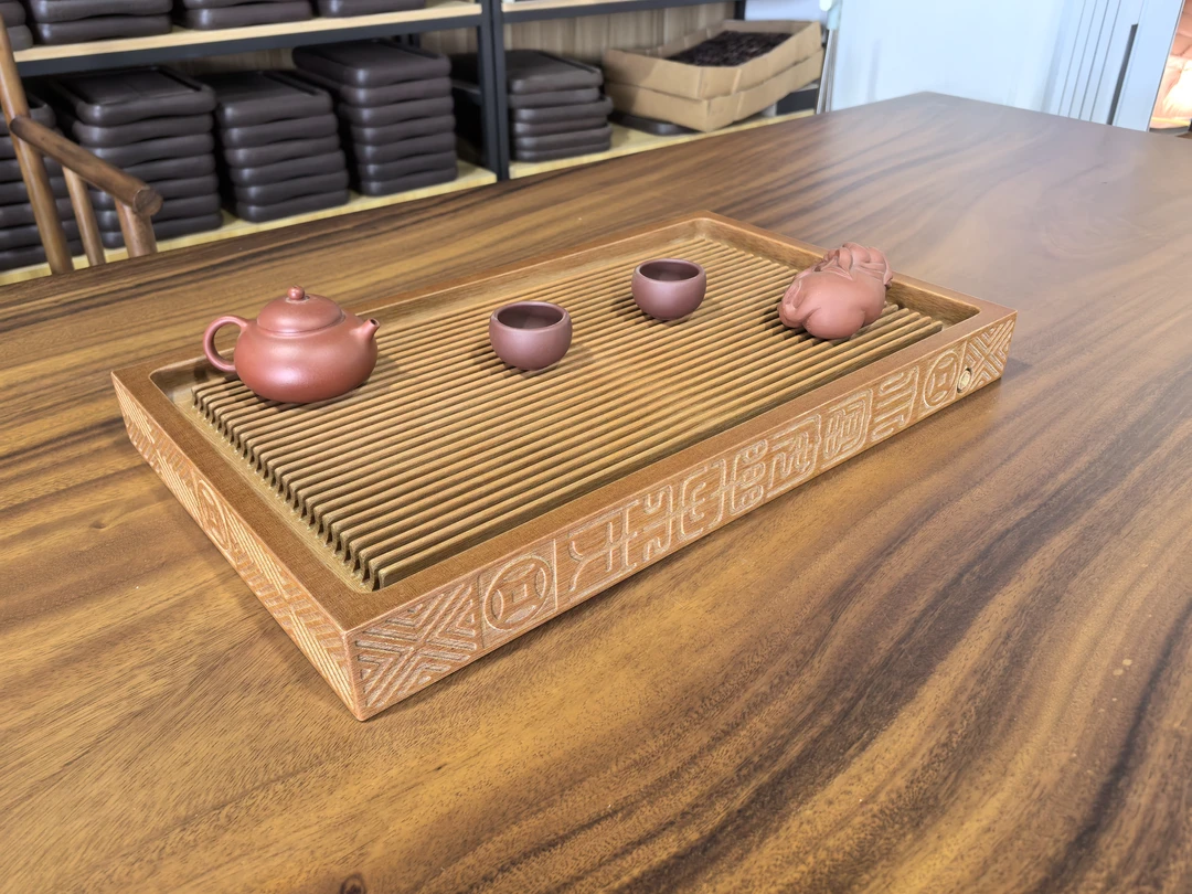 九缘正宗电木茶盘2025新款浮雕铜钱一体出水口简约家用茶盘50*30