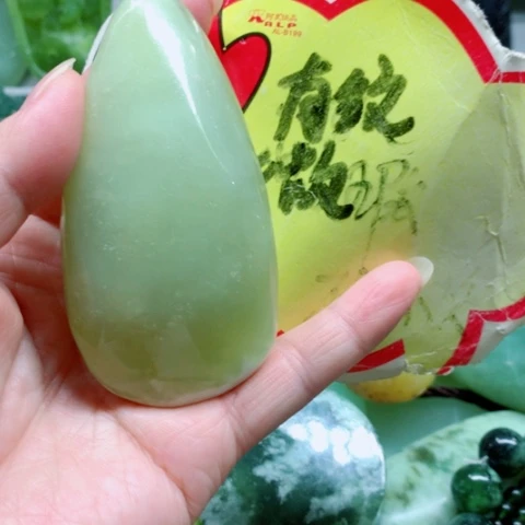 未镶嵌蛇纹石玉手把件